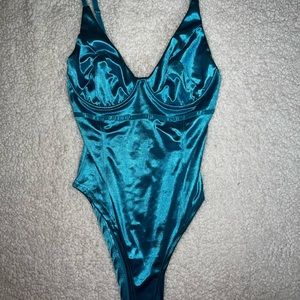shiny blue bodysuit!
